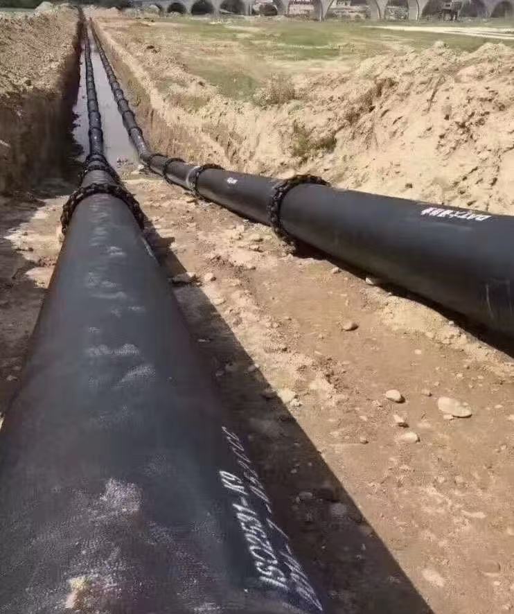 Tube auto-ancré en fonte ductile de type TF