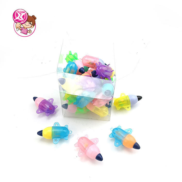 Toy airplane paintbrush tablet candy