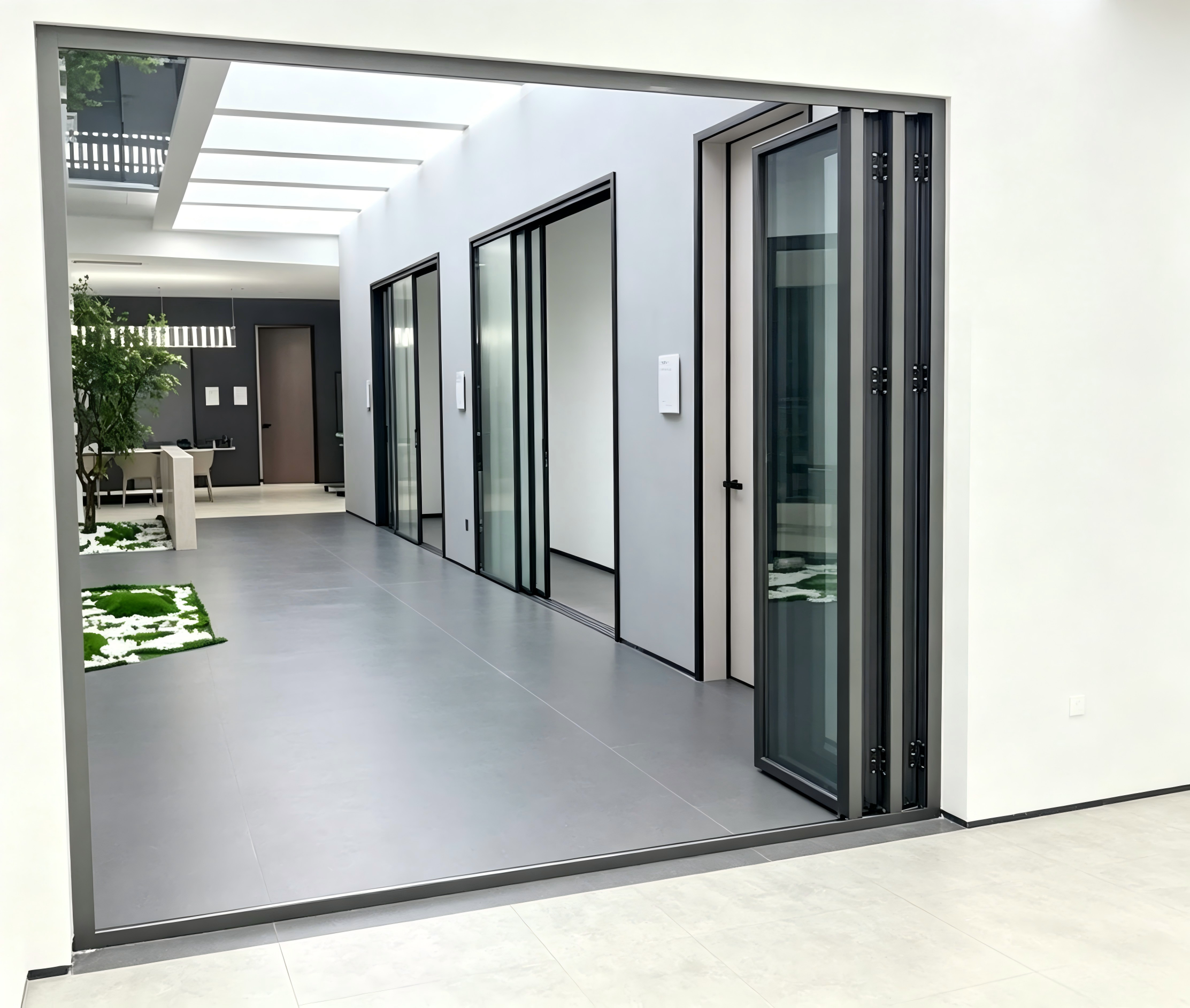 Minimalist Folding Glass Door with Full Height Panels Low Threshold Smart Home Ready and Double Silver Glazing