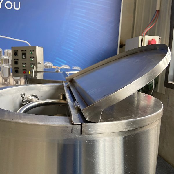 Manual open top lid