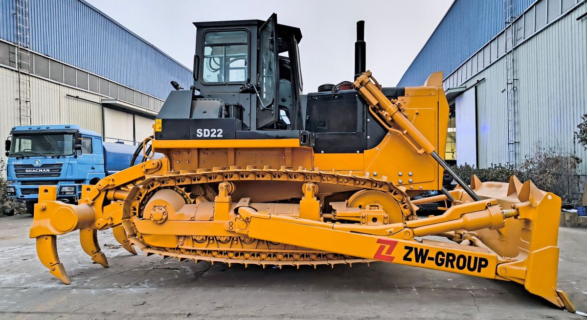 In large-scale mining and quarrying, this tracked bulldozer is essential for heavy-duty stripping and clearing, utilizing its massive blade capacity to move high volumes of debris