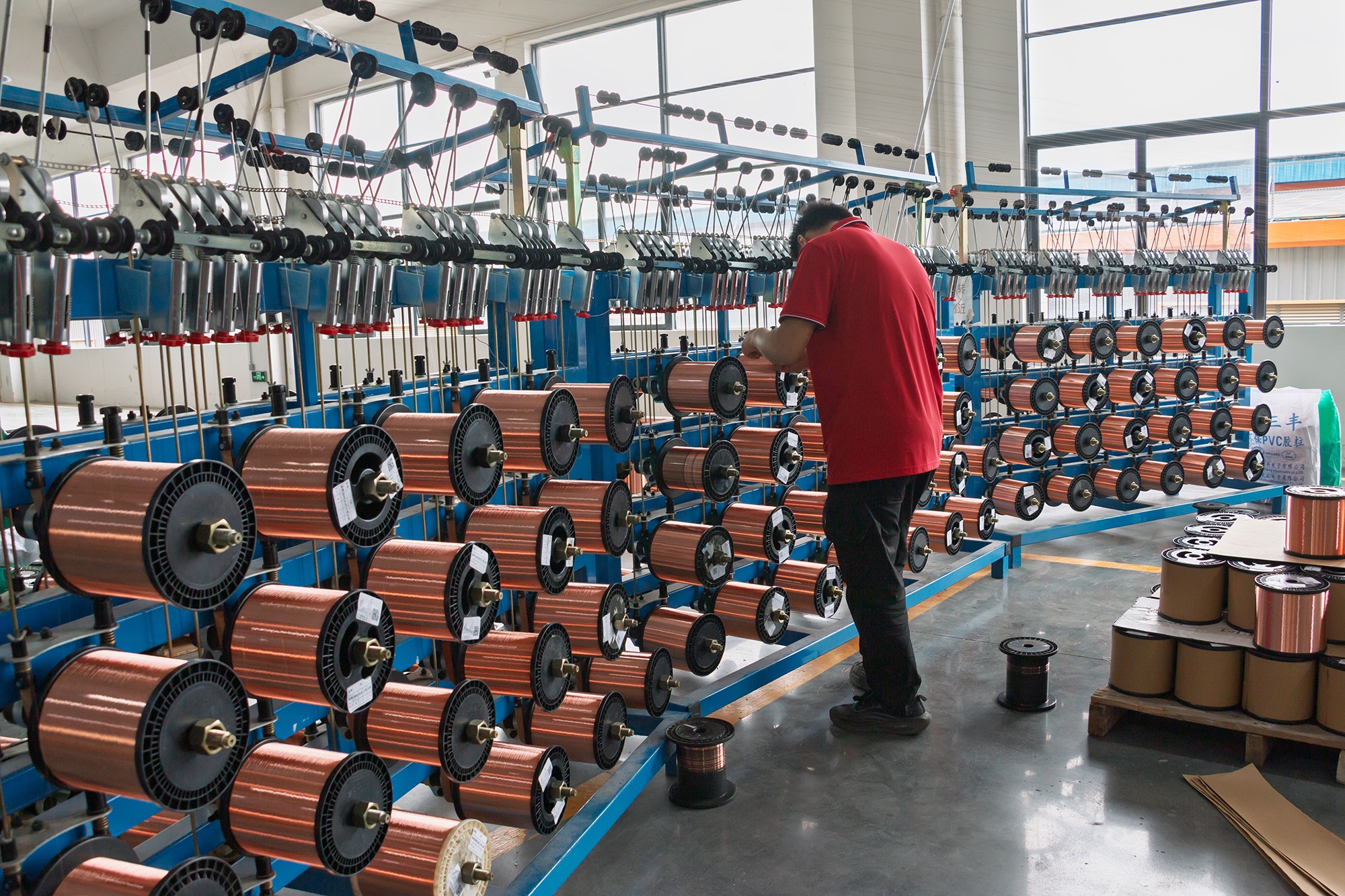 Worker Copper Stranding Operation
