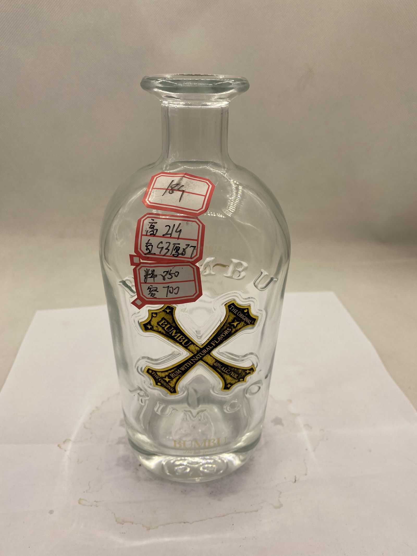 A26 Glass Rum Bottle, Embossed Liquor Bottle