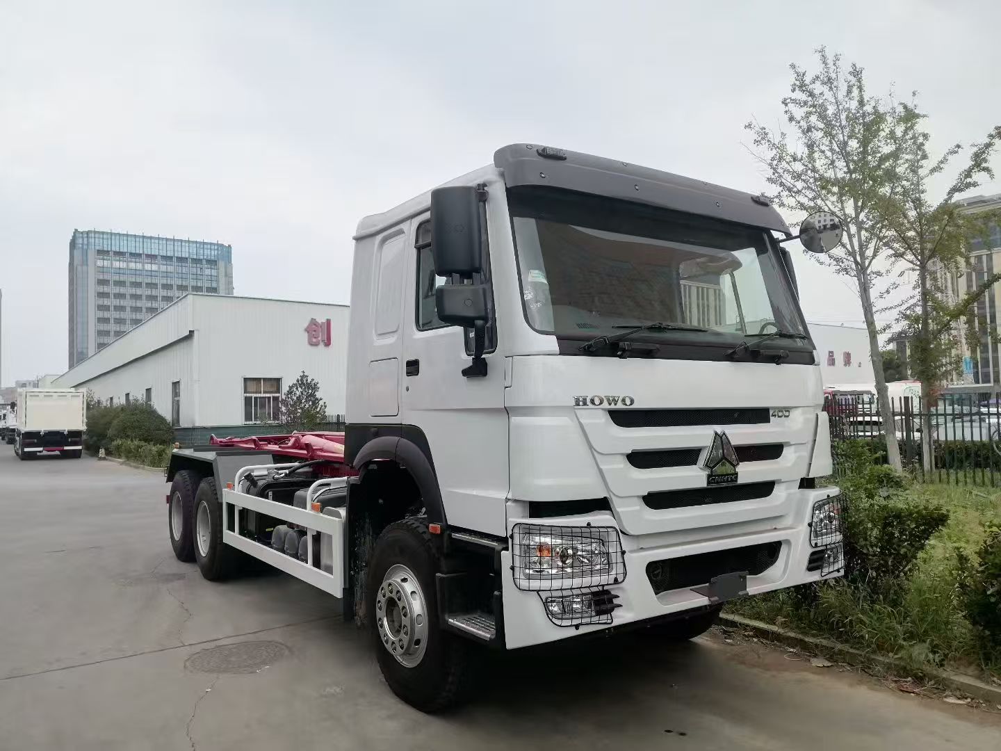 Camion à ordures à bras ampliroll HOWO 7