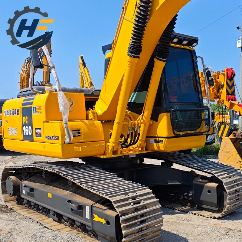 Utilisation d’une excavatrice Komatsu PC160LC d’occasion