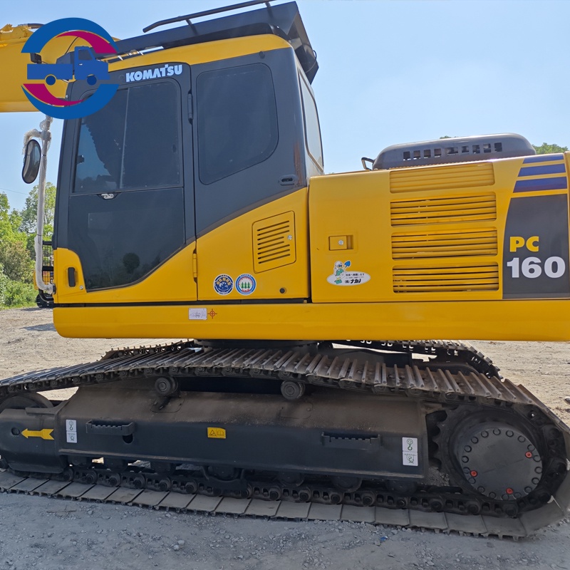 Utilisation d’une excavatrice Komatsu PC160LC d’occasion