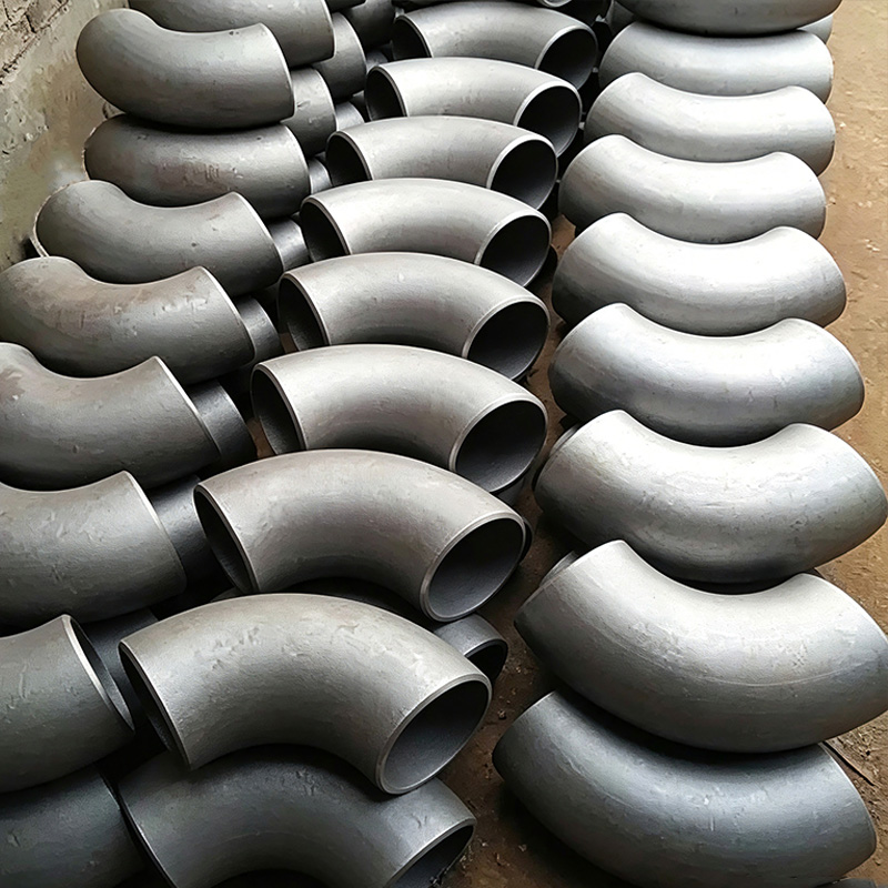 Seamless push-formed carbon steel elbow