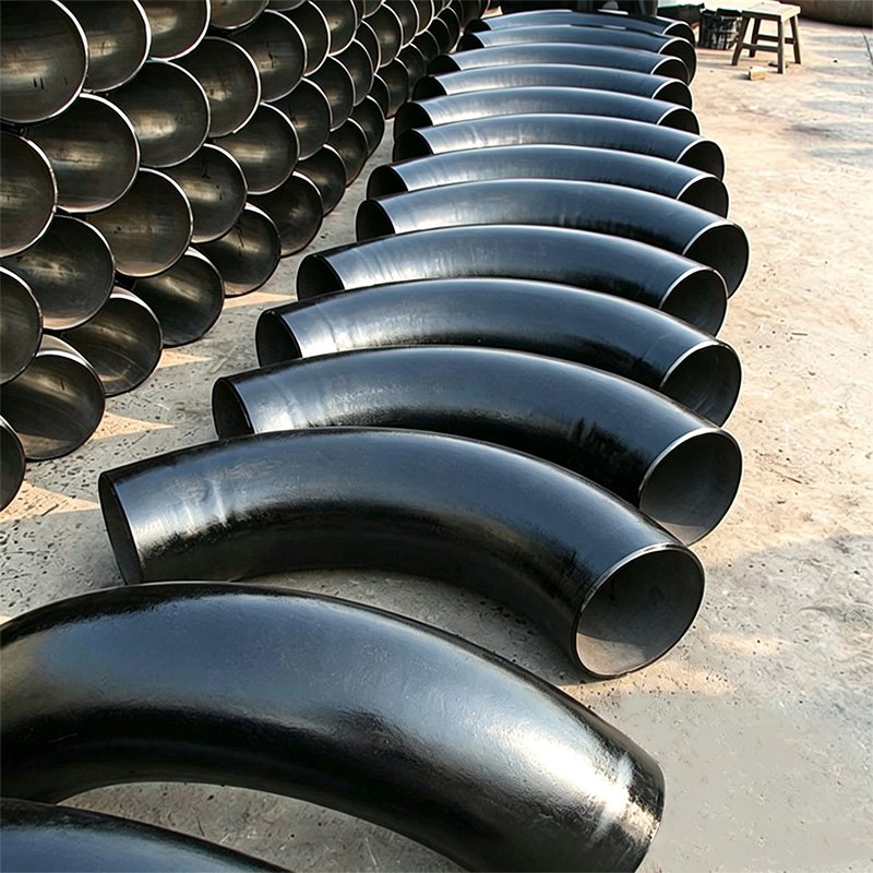Seamless push-formed carbon steel elbow