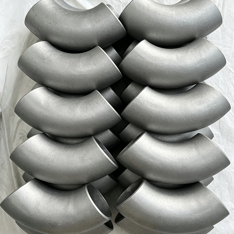 Carbon steel stamped elbow