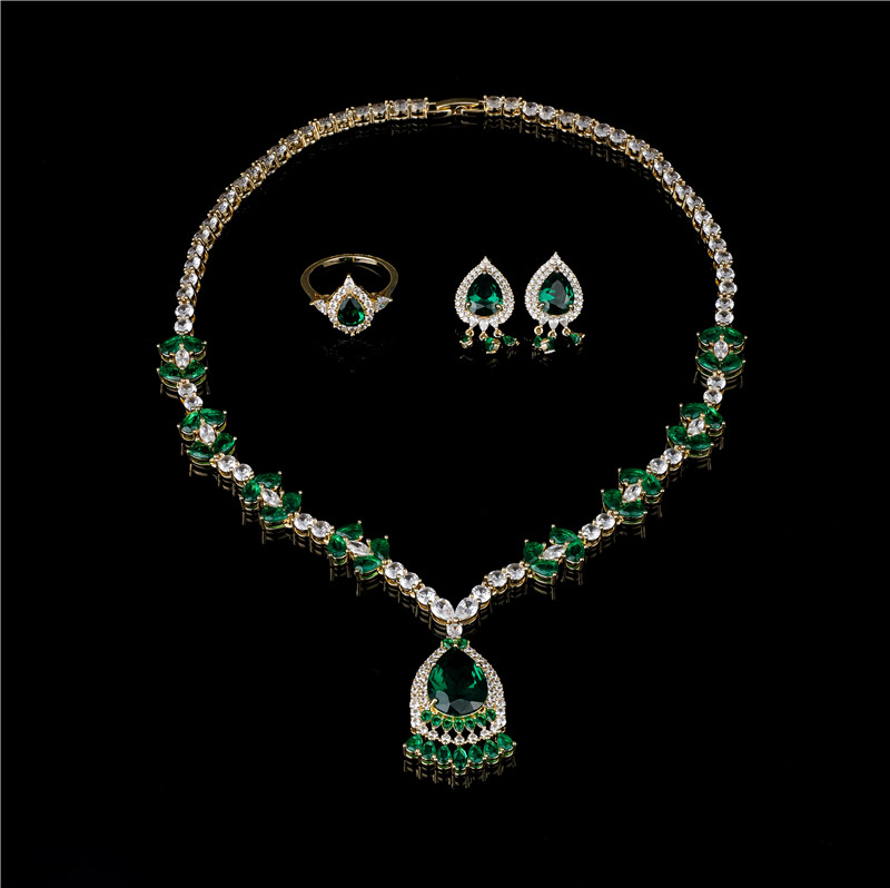 Noble Gold Tone Emerald-Color Crystal Necklace with Teardrop Center and Stud Earrings - Vintage Green Jewelry Set Noble Gold Tone Emerald-Color Crystal Necklace with Teardrop Center and Stud Earrings - Vintage Green Jewelry Set