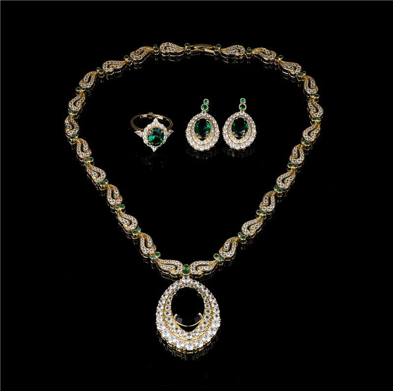Glam Gold Tone Clear Crystal Twisted Rope Necklace with Oval Drop and Hoop Earrings - Party Jewelry Set Glam Gold Tone Clear Crystal Twisted Rope Necklace with Oval Drop and Hoop Earrings - Party Jewelry Set