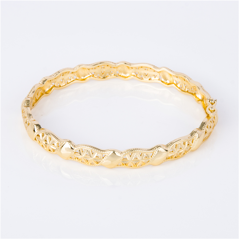 Gold-Plated Stackable Cuffs for Layered Arm Party Looks