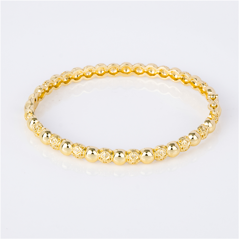 Gold-Plated Stackable Cuffs for Layered Arm Party Looks