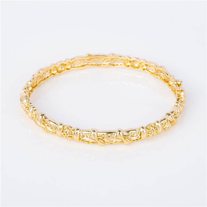 Gold-Plated Stackable Cuffs for Layered Arm Party Looks
