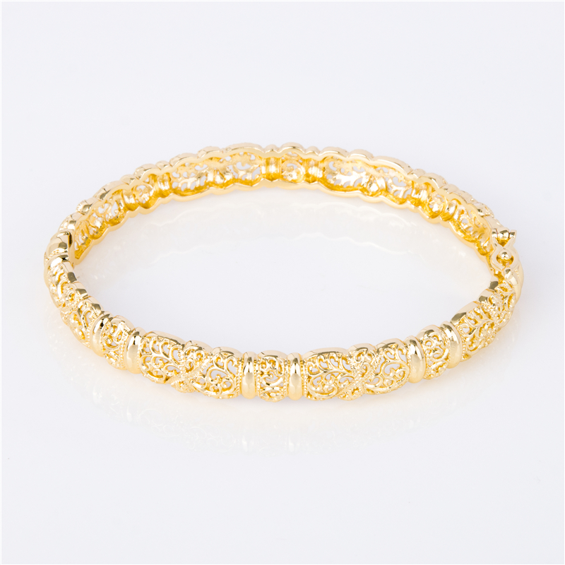 Gold-Plated Stackable Cuffs for Layered Arm Party Looks