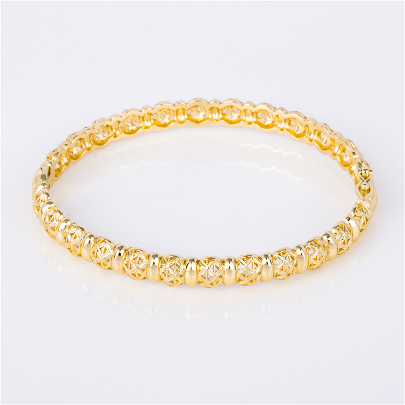 Gold-Plated Stackable Cuffs for Layered Arm Party Looks