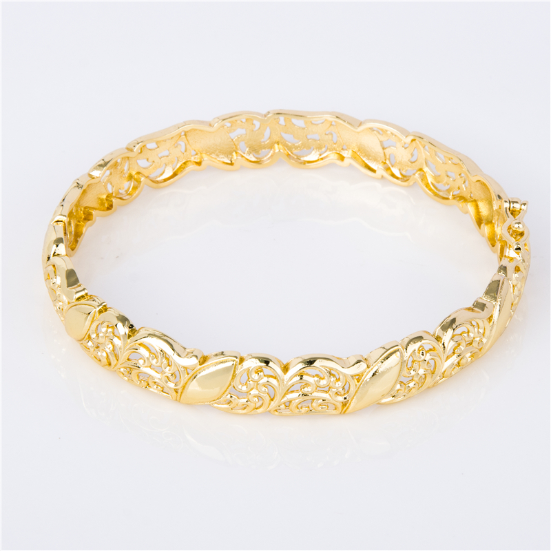 Gold-Plated Stackable Cuffs for Layered Arm Party Looks