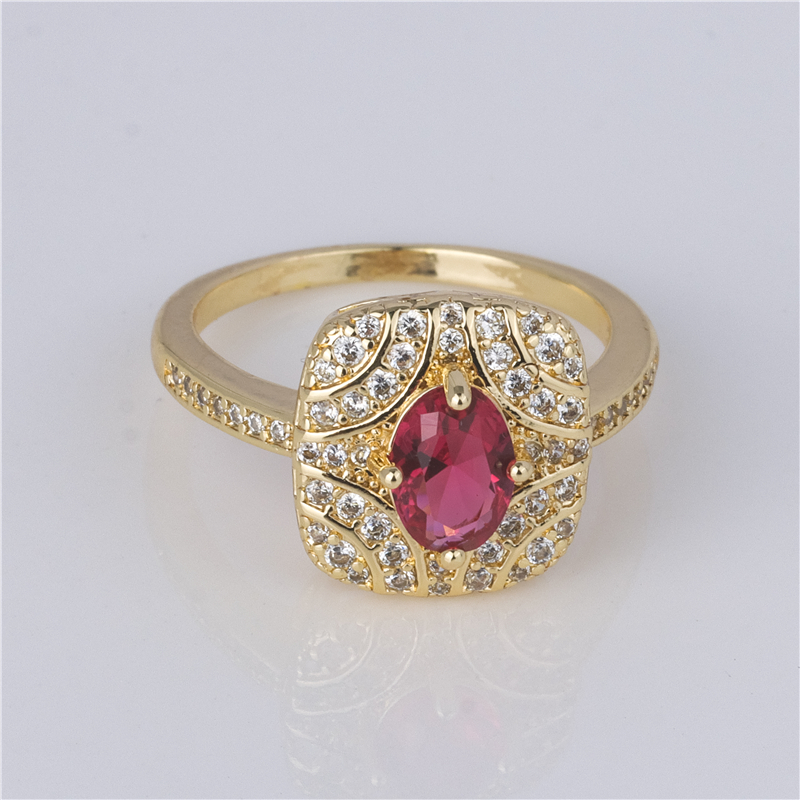 Gold-Plated Ruby Oval Ring - Red Stone with Ornate Pavé Halo, Royal Vintage Jewelry for Women Gold-Plated Ruby Oval Ring - Red Stone with Ornate Pavé Halo, Royal Vintage Jewelry for Women