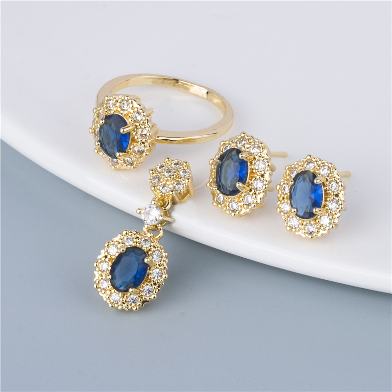 Gold-Plated Sapphire Oval Jewelry Set - 3 Piece Ring, Earrings & Pendant in Deep Ocean Blue Gold-Plated Sapphire Oval Jewelry Set - 3 Piece Ring, Earrings & Pendant in Deep Ocean Blue