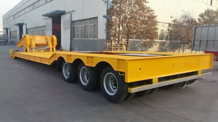 1788240040953281580910018560.jpg 3 axle low bed trailer