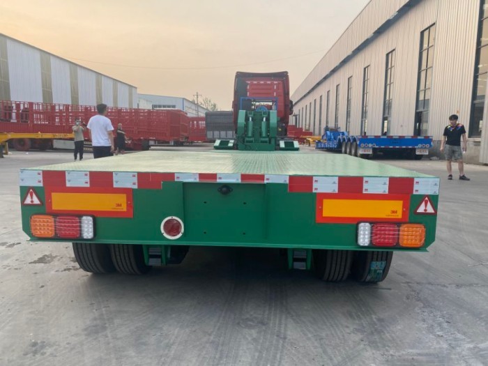 1788240064953281682894520320.jpg front loading low bed semi trailer
