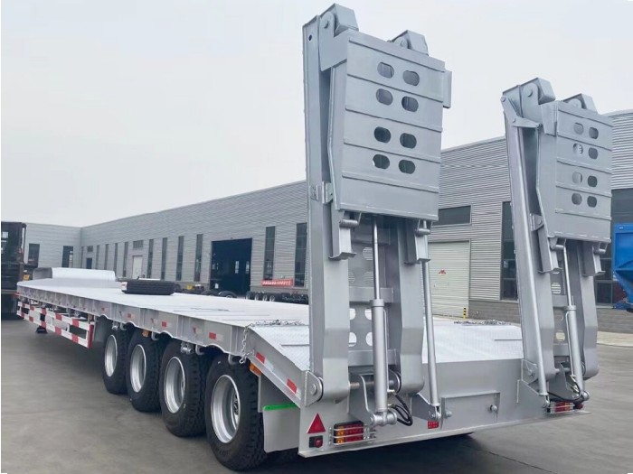 1788240206953282281291669504.png 4 axles lowbed semi trailer