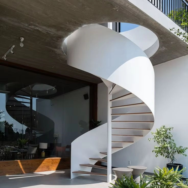 Minimally modern spiral staircase with glass railing, indoor use, steel wood structure