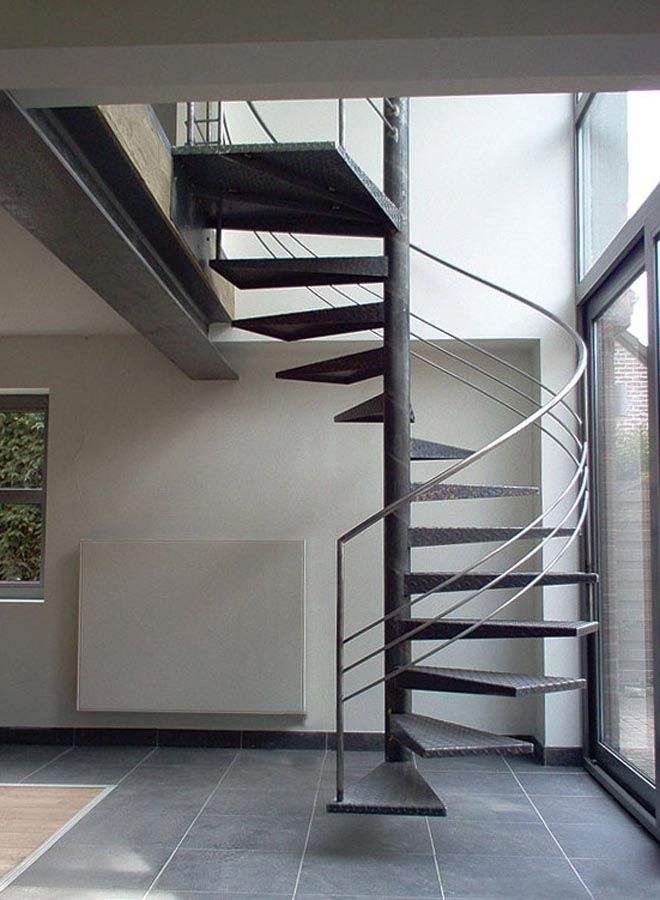 Floating heavy-duty spiral staircase with glass railing, traditional steel wood structure indoors