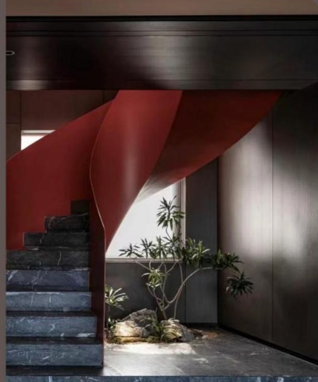 Red Ribbon Helical Staircase in Dark Marble