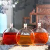 Flat round shaped fashion alcohol bottle