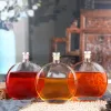 Flat round shaped fashion alcohol bottle