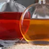Flat round shaped fashion alcohol bottle
