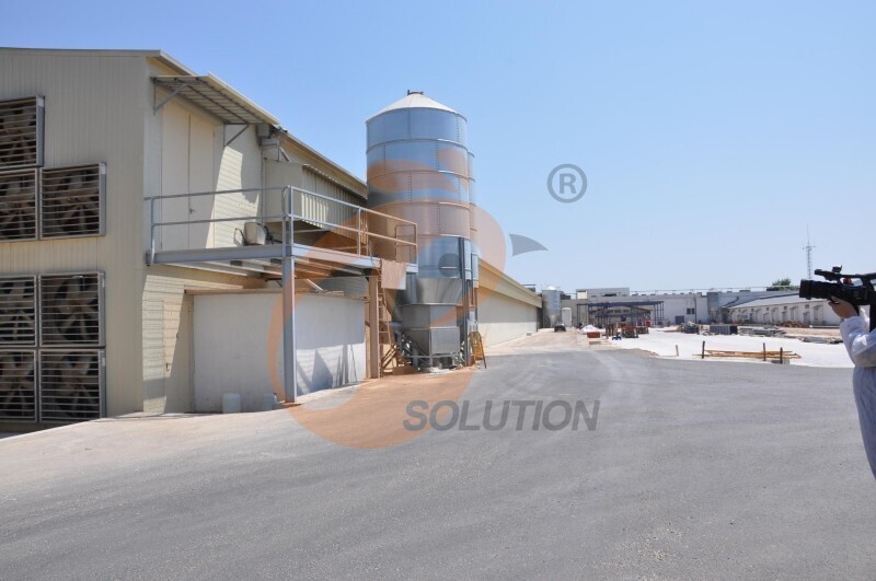 outside chicken house feed silo.JPG