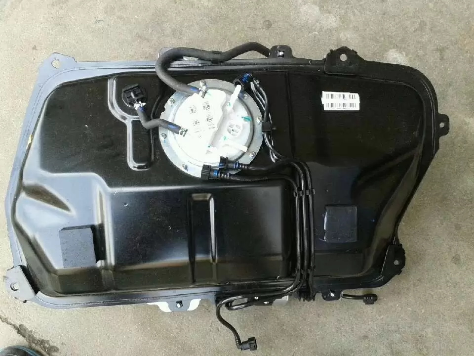 Black plastic fuel tank back