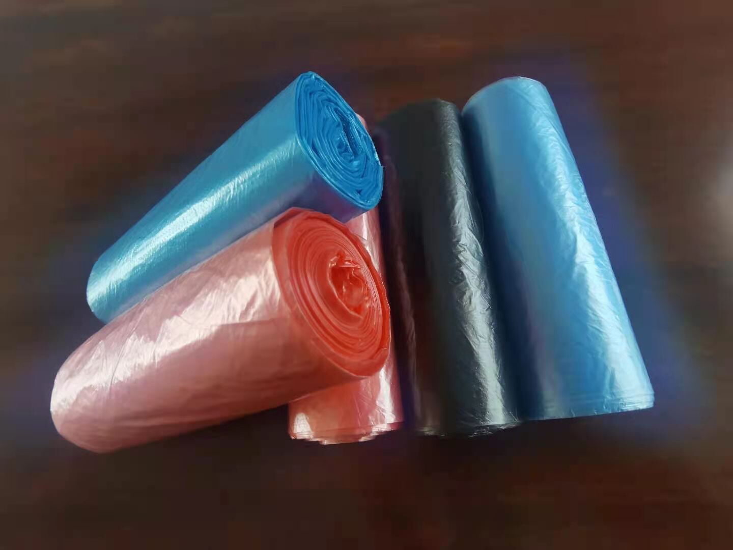 multi color  plastic garbage bags on roll