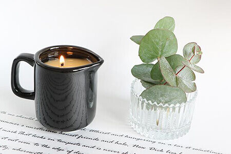 Why does the candle take off its cup