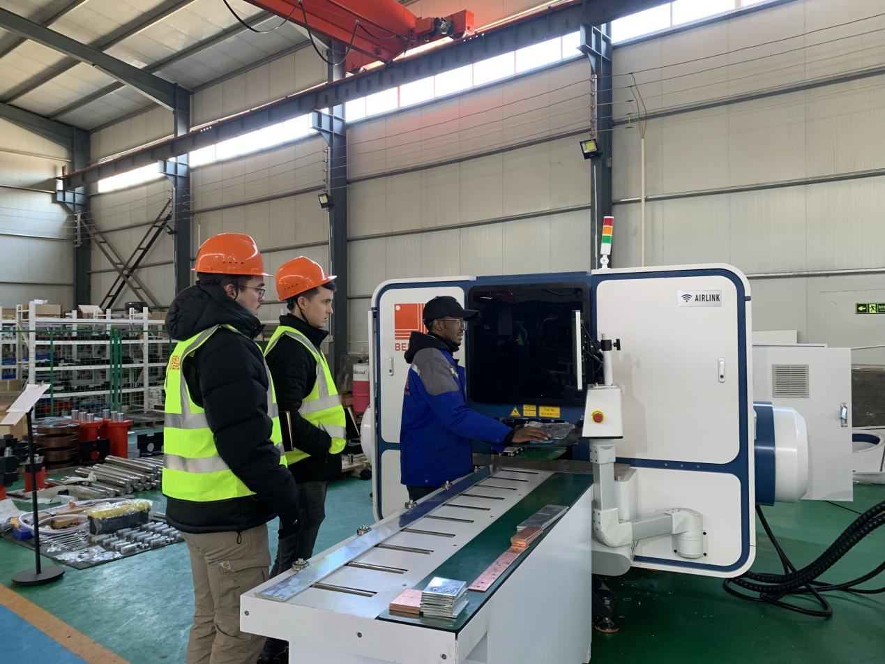 Our client, the UK multinational company sent their technicians to our factory for on-site study the software and operation of our busbar processing machine