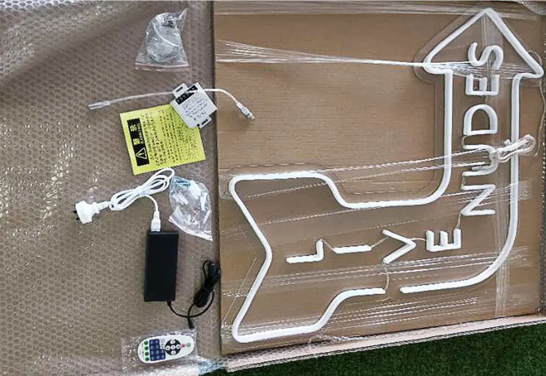 LIVE NUDES neon sign