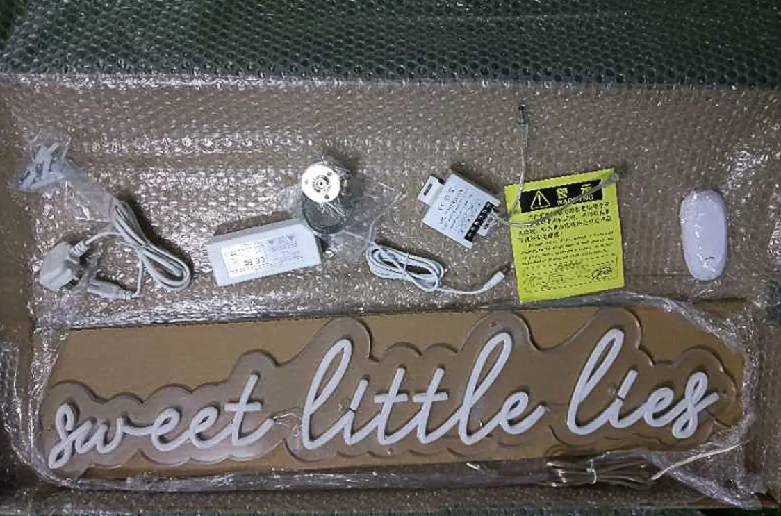 Sweet little lies neon sign