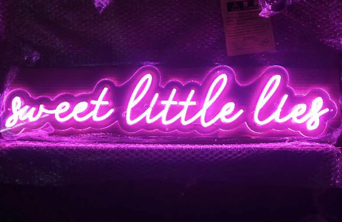Sweet little lies neon sign