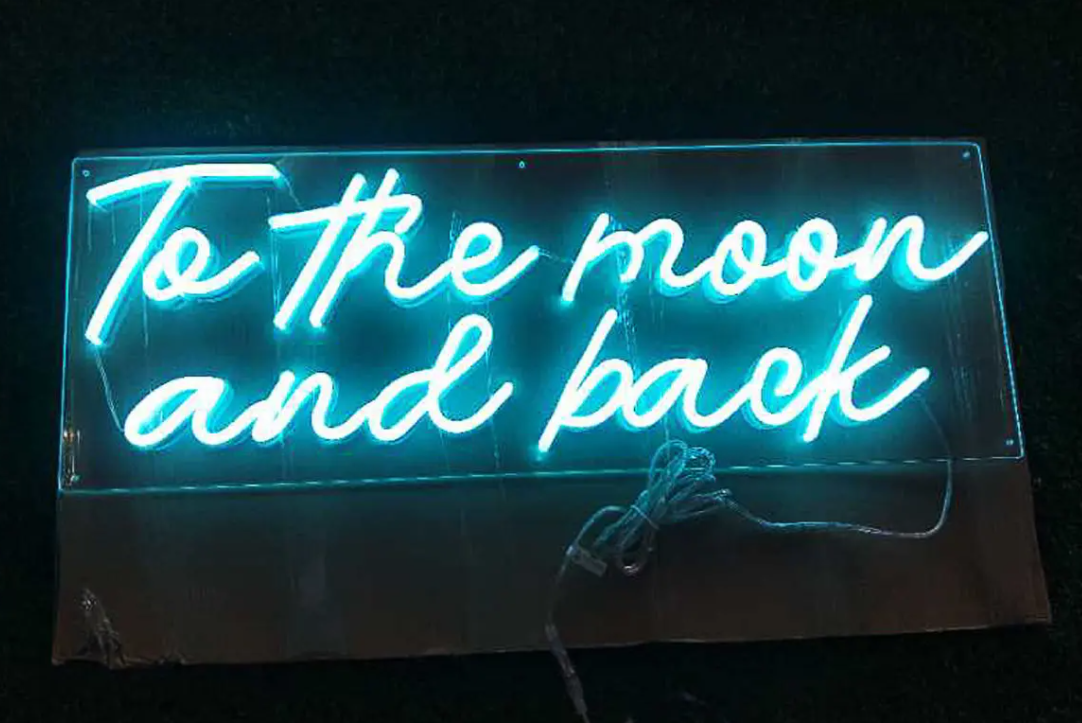 To the moon and back neon sign