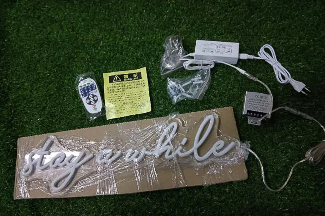 Stay a while neon sign