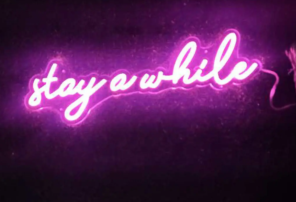 Stay a while neon sign