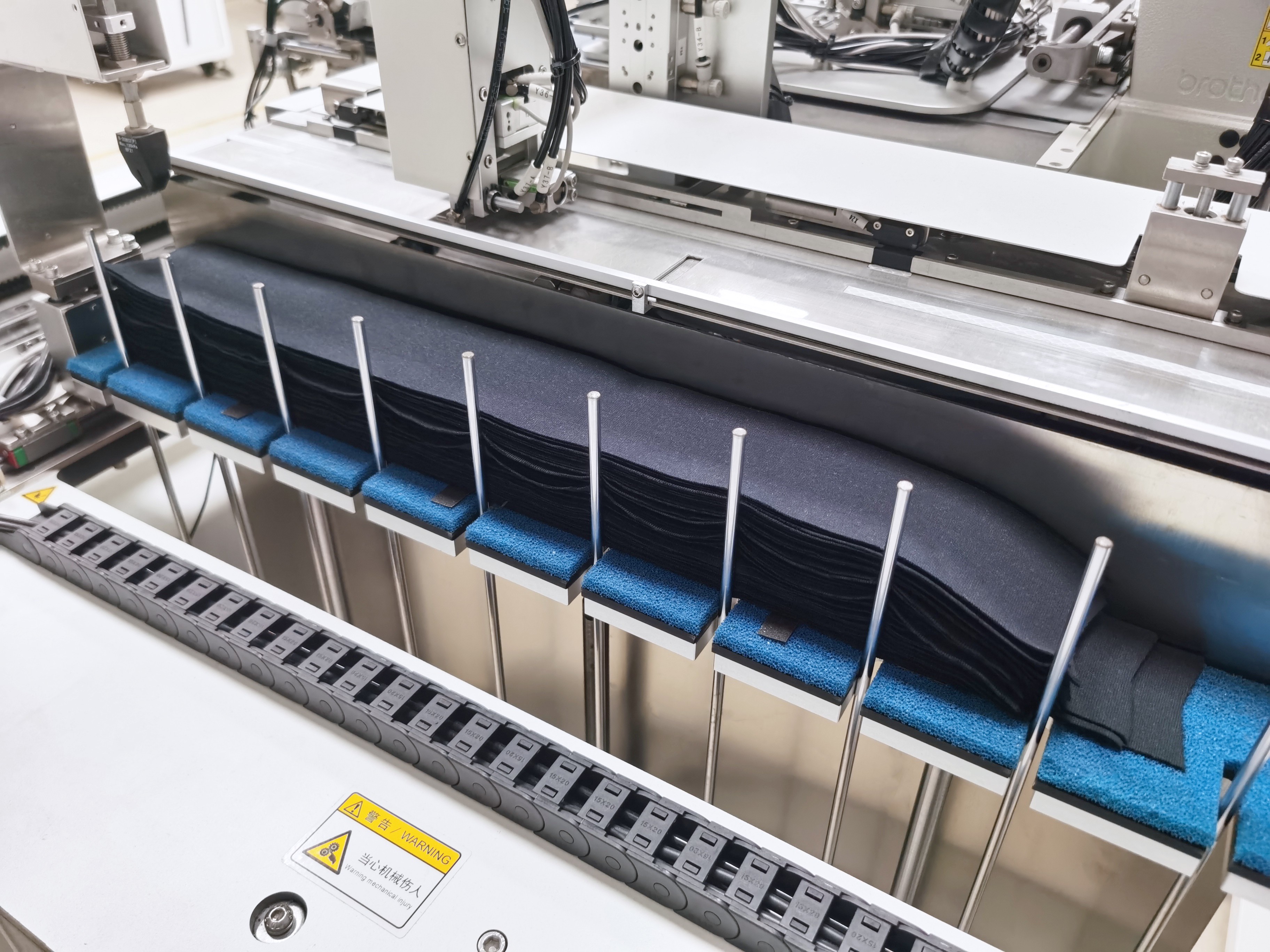 Automatic Neck Rib Joining Machine