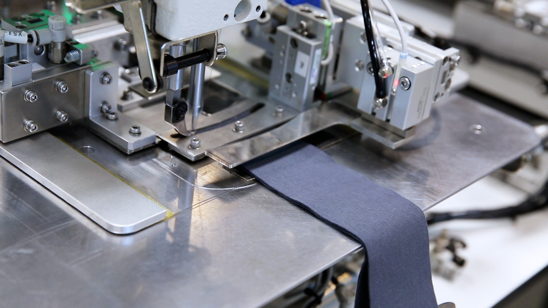Automatic Neck Rib Joining Machine