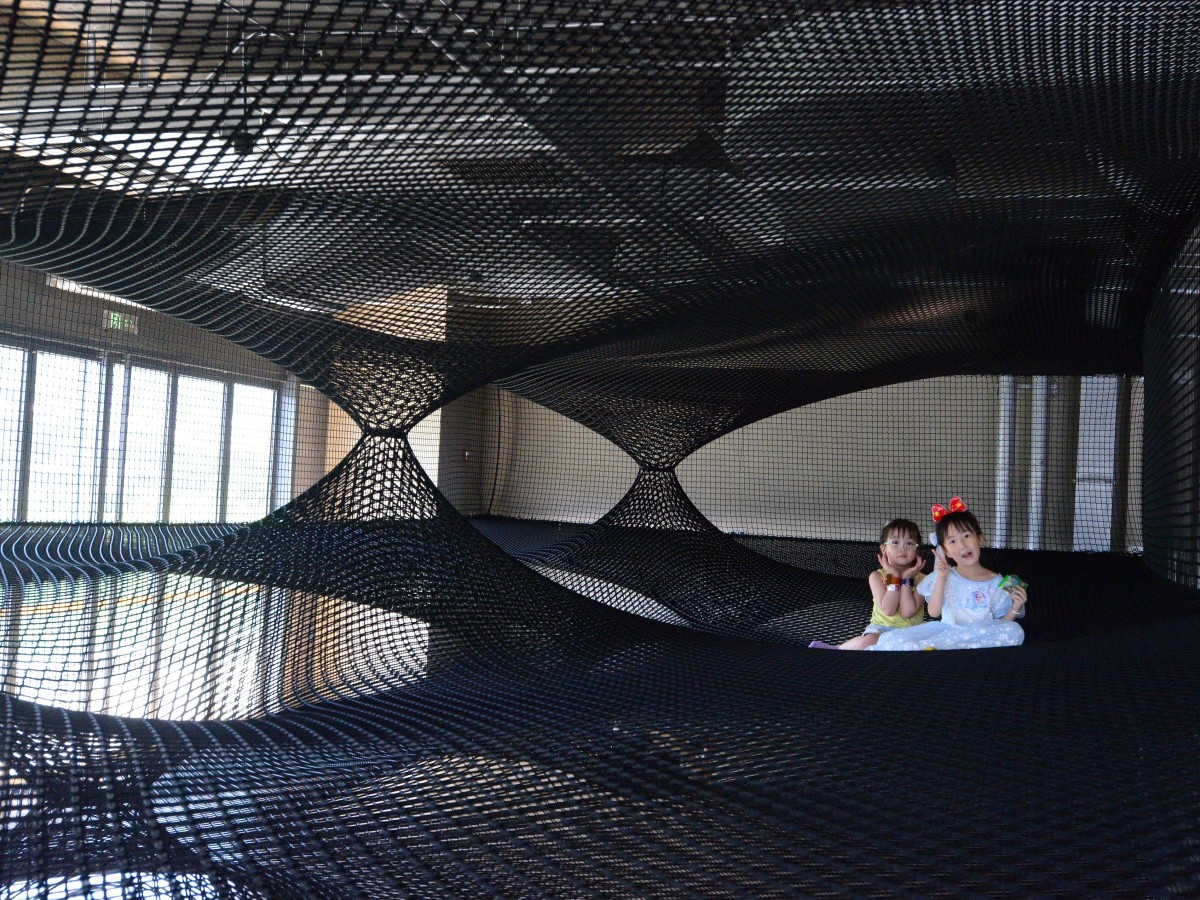 black-rope-net-trampoline-art-installation