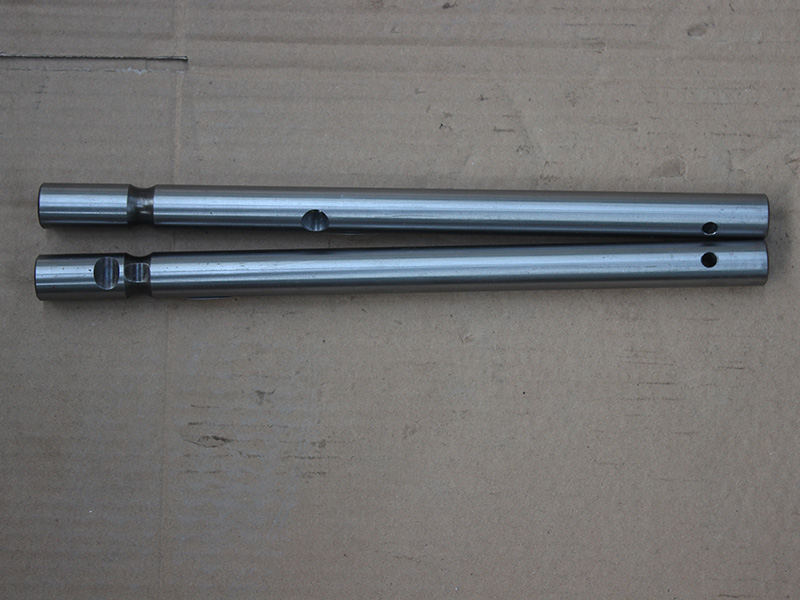 Reverse shift fork shaft