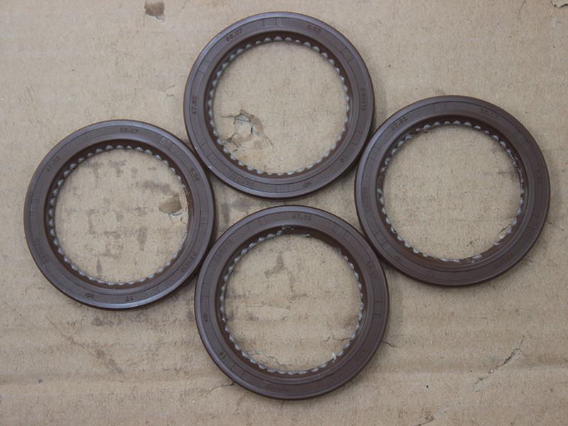 A shaft bearing cap oil seal