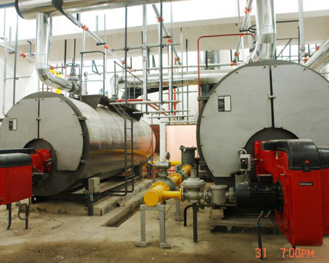 Oil/gas fired steam boiler