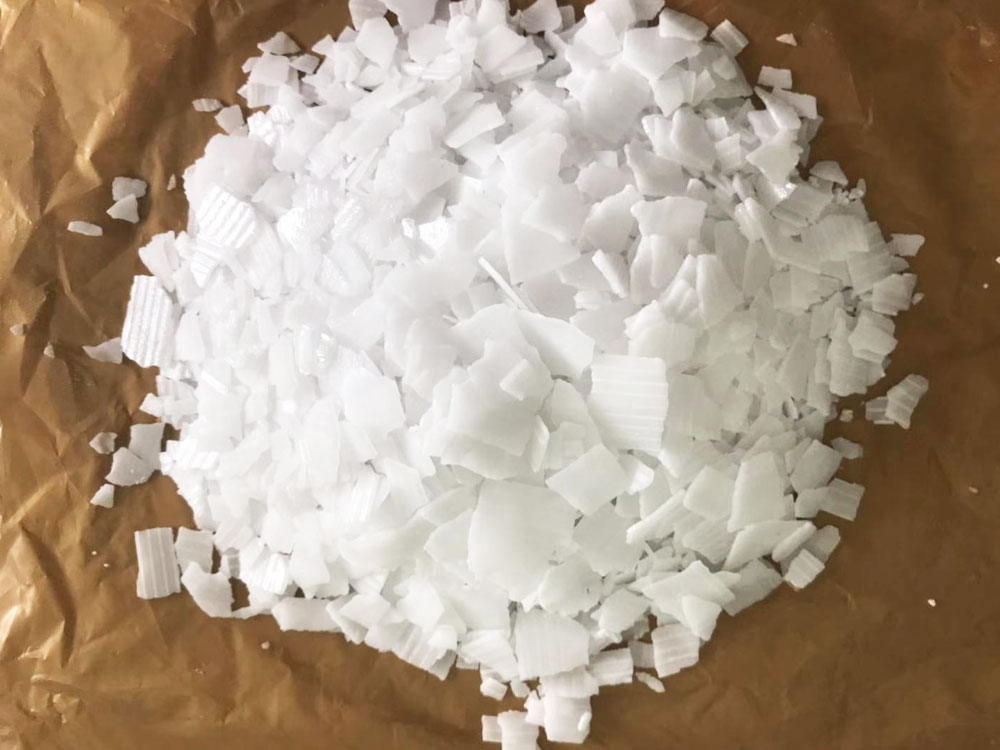 What is flaked sodium hydroxide?